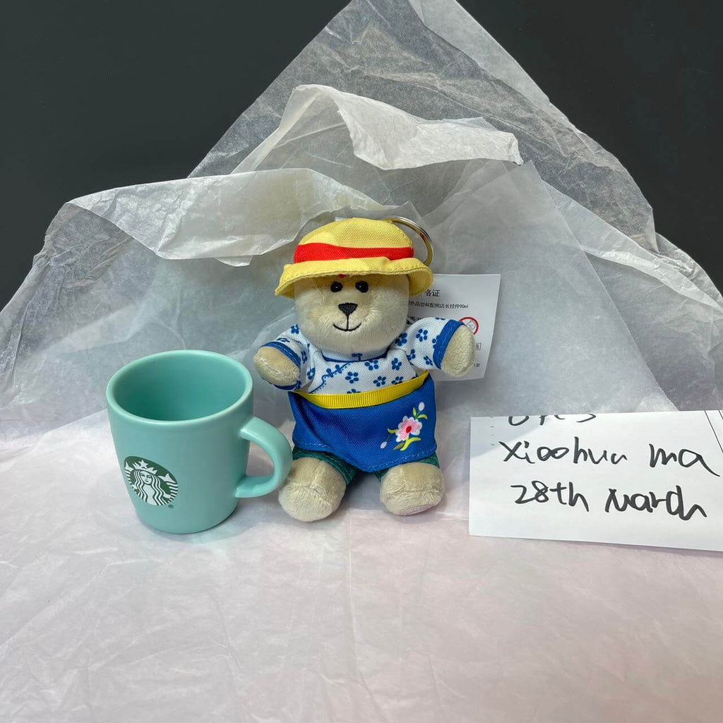 on sale Starbucks cup and doll