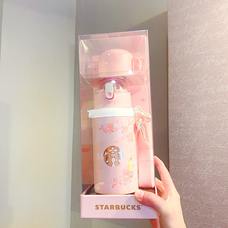 https://loveinstarbucks.com/cdn/shop/products/starbucks-2022-china-sakura-double-head-thermos-cup-550ml-828523.jpg?v=1674153065